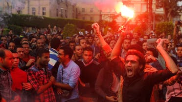 Cairo University students shout slogans against the government at the university's campus in Giza, on the outskirts of Cairo November 30, 2014.  (Reuters)
