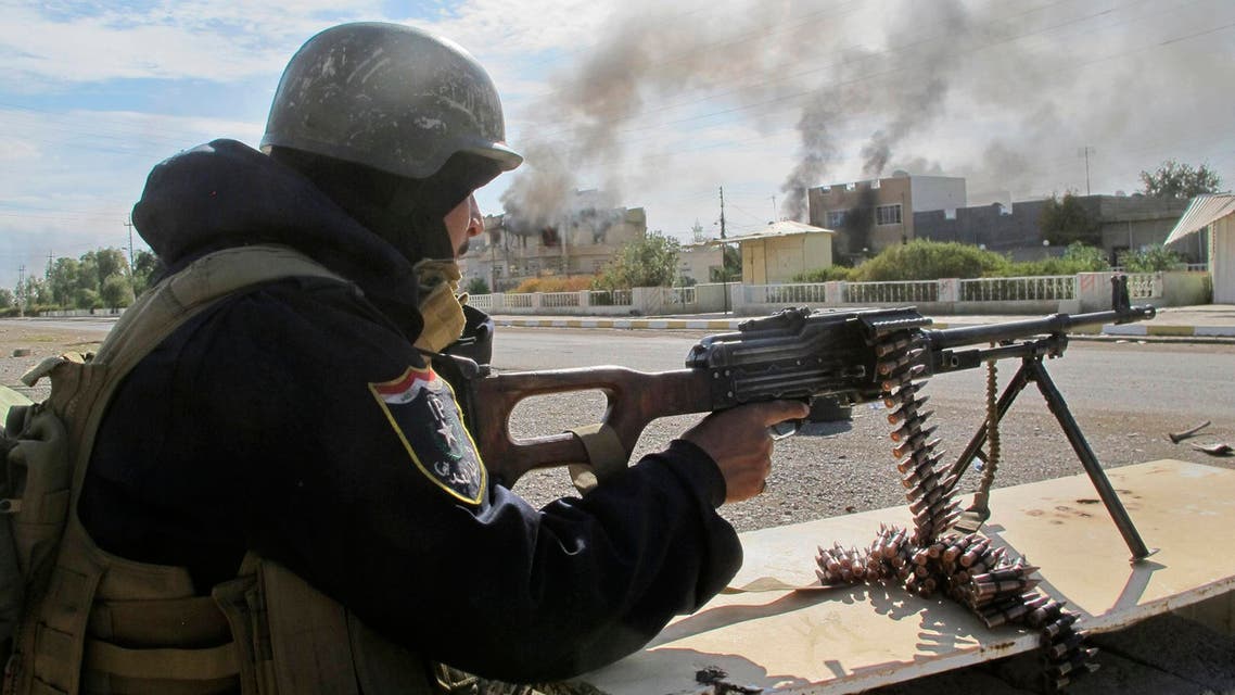 A member of the Iraqi security forces mans a gun during an intensive security deployment after taking control of Saadiya in Diyala province from Islamist State militants, November 24, 2014. (Reuters)