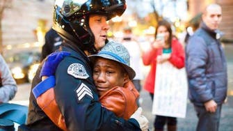 Photo of boy hugging officer at Ferguson protest goes viral