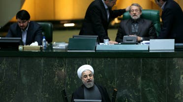  Iranian President Hassan Rouhani speaks during a parliament session in Tehran on November 26, 2014 to defend his nominee for the ministry of science, research and technology. (AFP)