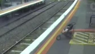 Watch the shocking moment a pram rolls onto the tracks in Australia