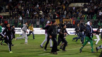 Soccer fans storm Cairo stadium ahead of match