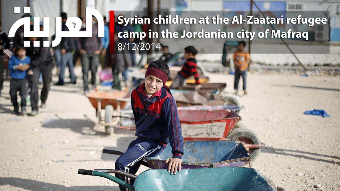 Syrian children at the Al-Zaatari refugee  camp in the Jordanian city of Mafraq
