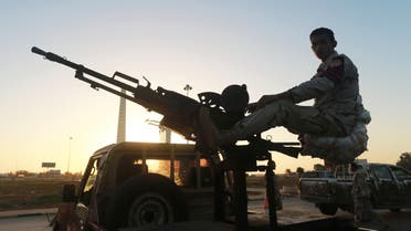 A Libyan military personnel mans a checkpoint in the city center in Benghazi December 4, 2014, where clashes between pro and anti-government forces have taken place. (Reuters)
