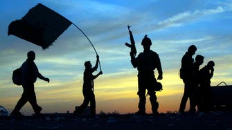 Shiite pilgrims flock to Iraq holy city, government fears attack