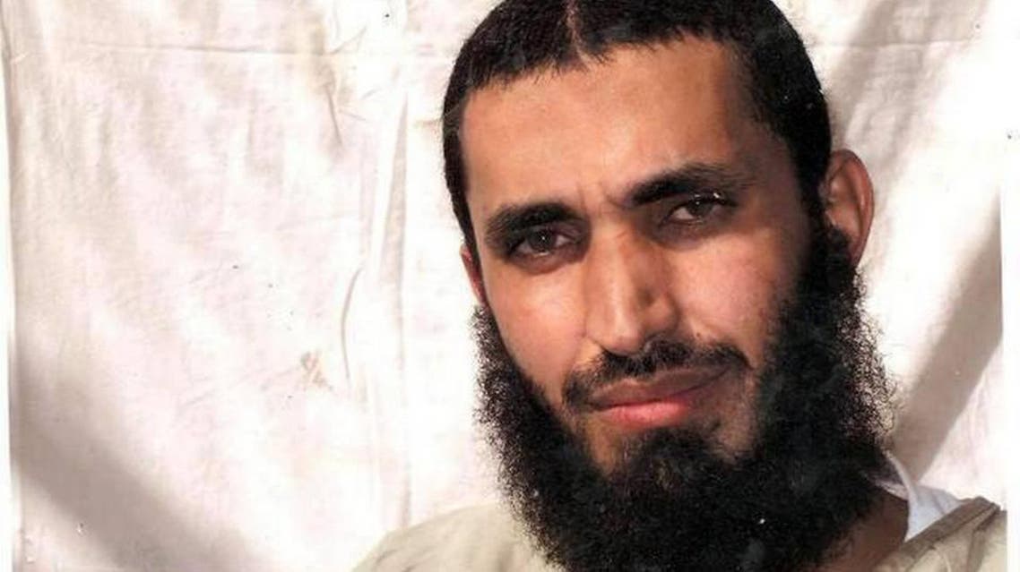 Abdel Malik Wahab al Rahabi is seen here posing for his family somewhere inside Guantánamo in this undated, U.S.-military approved photo taken by the International Red Cross, and furnished to The Miami Herald by his attorney. Courtesy attorney David Remes Read more here: http://www.miamiherald.com/news/nation-world/world/americas/article1959705.html#storylink=cpy