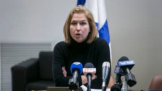 Israel’s Livni joins opposition chief to challenge PM in election