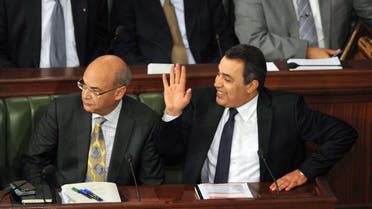 Tunisian Prime Minister Mehdi Jomaa Finance minister Hakim Ben Hamouda Tunisia AFP