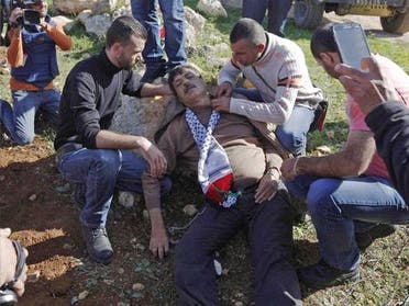 Ziad Abu Ein lying injured after he was in an altercation with Israeli troops. Reuters 