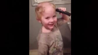 Oops! Child mistakenly combs own hair with electric razor  
