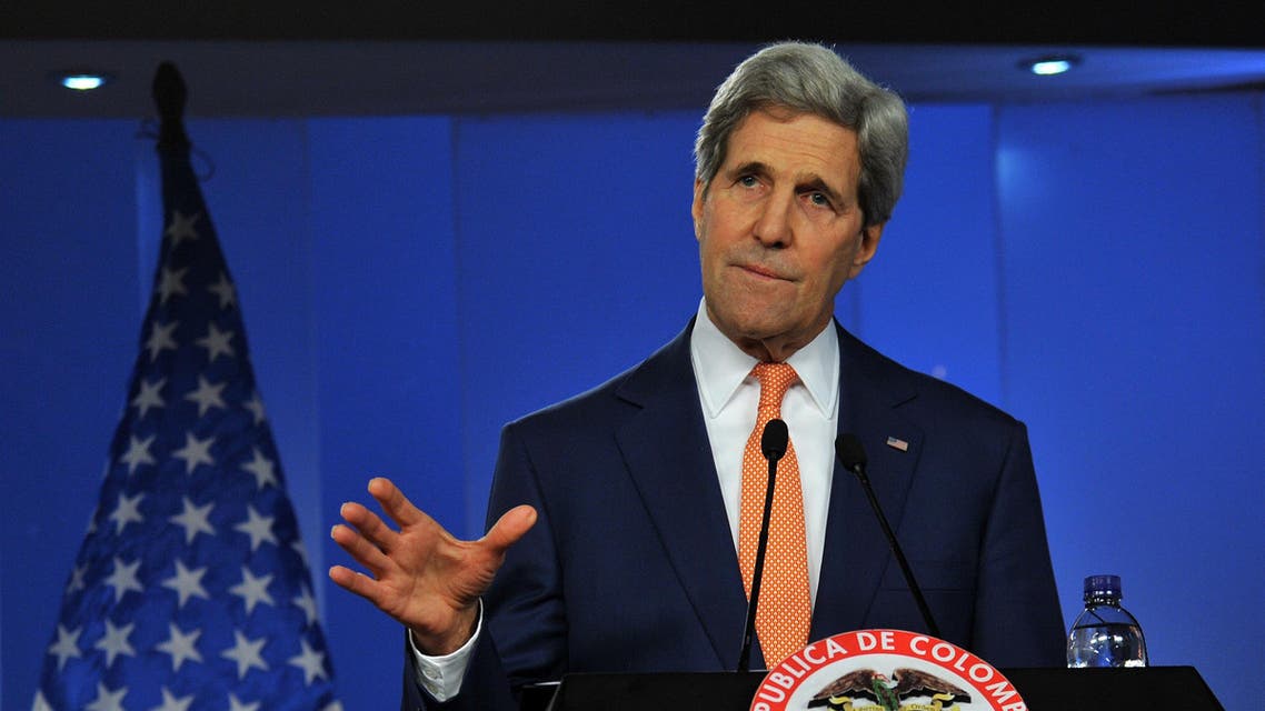US Secretary of State John Kerry speaks next to Colombian President Juan Manuel Santos (out of frame) during a press conference they gave after a meeting at Narino presidential Palace in Bogota, on December 12, 2014. AFP