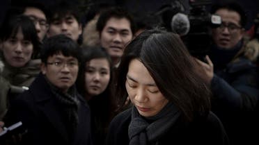 Cho Hyun-ah, also known as Heather Cho, daughter of chairman of Korean Air Lines, Cho Yang-ho, appears in front of the media outside the offices of the Aviation and Railway Accident Investigation Board of the Ministry of Land, Infrastructure, Transport, in Seoul December 12, 2014. (ReuterS)