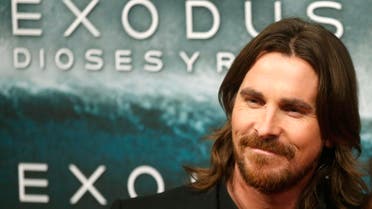 Cast member Christian Bale poses for photographs as he arrives for film world premiere of Exodus: Gods and Kings in Madrid , December 4, 2014.  (Reuters)