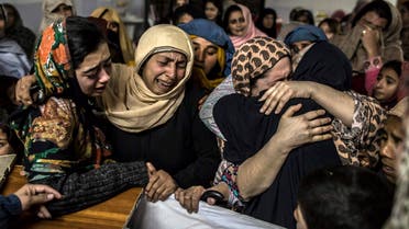 Women mourn their relative Mohammed Ali Khan, 15, a student who was killed during an attack by Taliban gunmen on the Army Public School, at his house in Peshawar December 16, 2014.  (Reuters)
