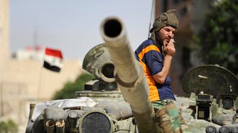 Activists: Qaeda seizes scores of Syrian army tanks