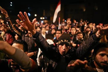 Egyptian anti-Mubarak protesters chant slogans as they gather in Abdel Moneim Riad Square in Cairo on November 29, 2014 ©Mohamed el-Shahed (AFP)