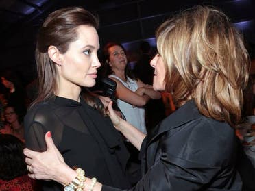 Angelina Jolie (L) and Amy Pascal at the Women in Entertainment Breakfast, Los Angeles. (Photo courtesy: Rex)