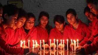 Pakistanis pray, resolve to fight terror at stricken school 