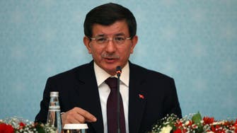 Turkish PM says negotiating with Assad like shaking hands with Hitler