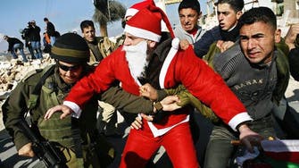 Palestinian Santas protest in Bethlehem