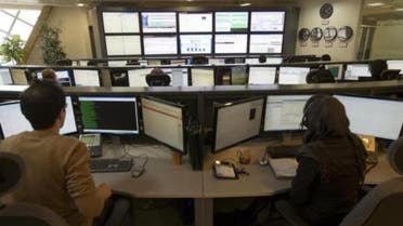 Technicians monitor data flow in the control room of an internet service provider in Tehran Feb. 15, 2011. (Reuters)