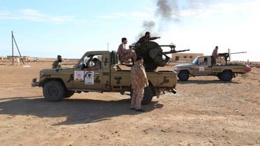 Libyan Army Forces belonging to Libya's rival government, that are part of the Alshorooq (Libya Dawn) operation to free oil ports, are seen on the outskirts of Al Sidra oil port Dec. 14, 2014. (Reuters)