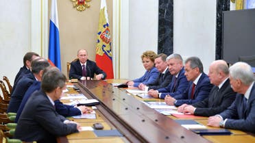  Russian President Vladimir Putin (C) chairs a Security Council meeting at the Kremlin in Moscow on Dec. 26, 2014. (AFP)