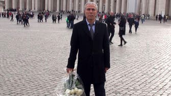 John Paul II Turkish gunman lays flowers at Vatican tomb