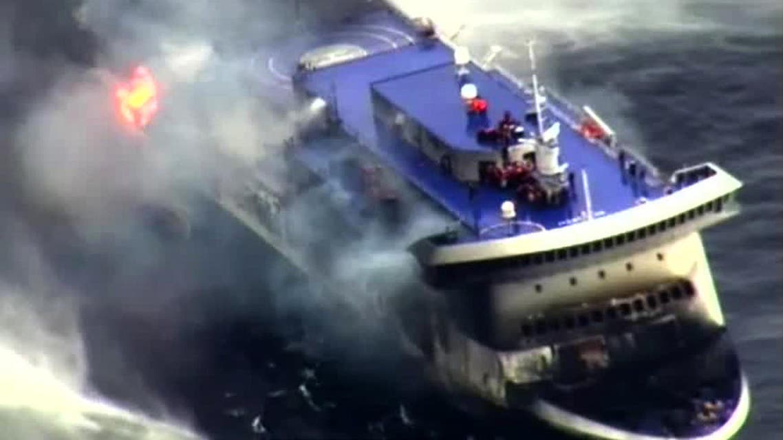 A photo grab taken from a video made available by the Guardia costiera, Italy's coast guard organization on Dec. 28, 2014, shows the burning ferry "Norman Atlantic" adrift off Albania. (AFP)