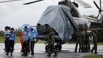 Stormy weather halts search in AirAsia crash