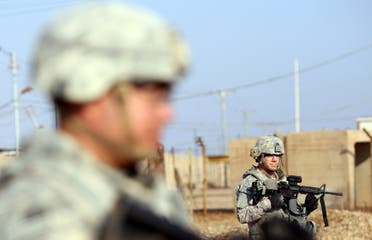 File photo of US soldiers patrolling the Taji base complex located 30 kilometers north of the capital Baghdad. (AFP)