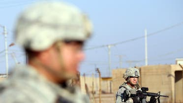 U.S. soldiers patrol the Taji base complex which hosts Iraqi and U.S. troops and is located thirty kilometers north of the capital Baghdad on Dec. 29, 2014. (AFP) 