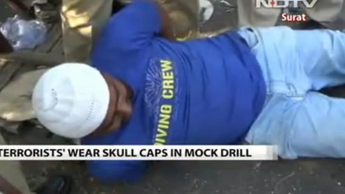 A mock ‘terrorist’ wears a skullcap, widely worn by Muslims in India, in this video of a ‘terror’ drill. (Photo courtesy: NDTV)