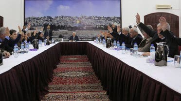 Palestinian President Mahmoud Abbas (C) meets with the Palestinian leadership to sign international agreements in the West Bank city of Ramallah, in this December 31, 2014. (Reuters)