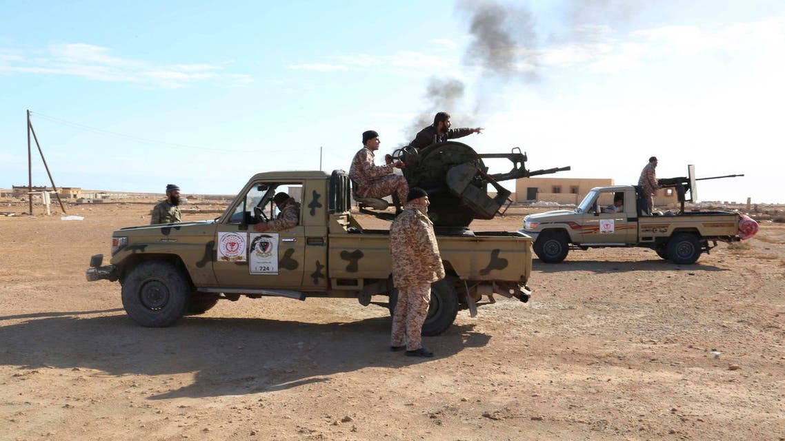 Libyan Army Forces belonging to Libya's rival government, that are part of the Alshorooq (Libya Dawn) operation to free oil ports, are seen on the outskirts of Al Sidra oil port Dec. 14, 2014. (Reuters)
