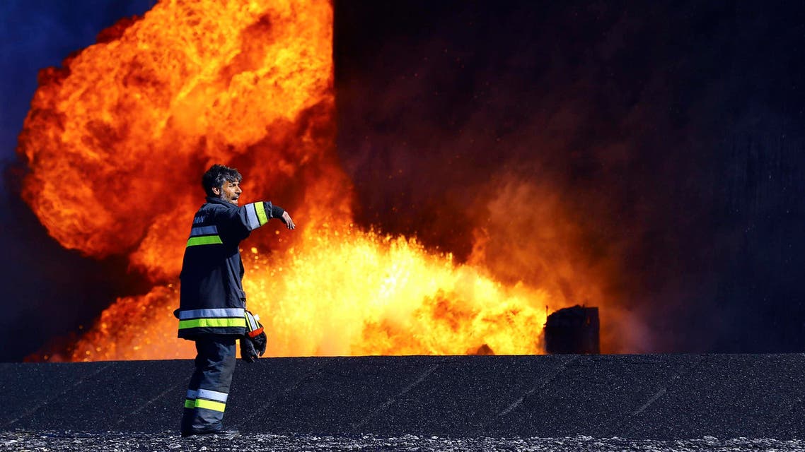 Libya al-sidr ed-sidr oil fire reuters fire fighter