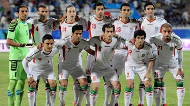 Players of Iran pose for a group photo before the 2015 Asian Cup qualifying match against Kuwait in Kuwait City, Kuwait, on March 26, 2013. 