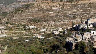 Israel says barrier to spare ancient Palestinian village 