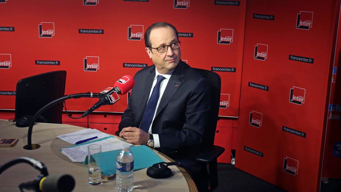 French President Francois Hollande prepares to answer journalists during a live interview at the France Inter radio station studios in Paris Jan. 5, 2015. (Reuters)