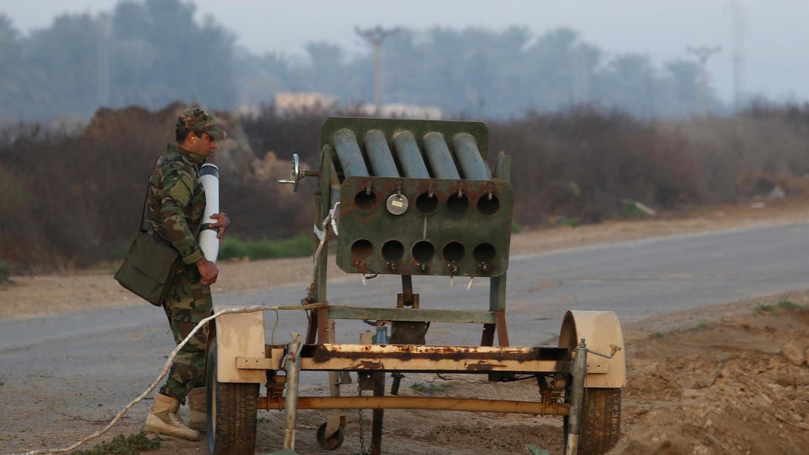 An Iraqi soldier loads a multiple rocket launcher during clashes between ISIS group fighters, January 2, 2015. (AFP)