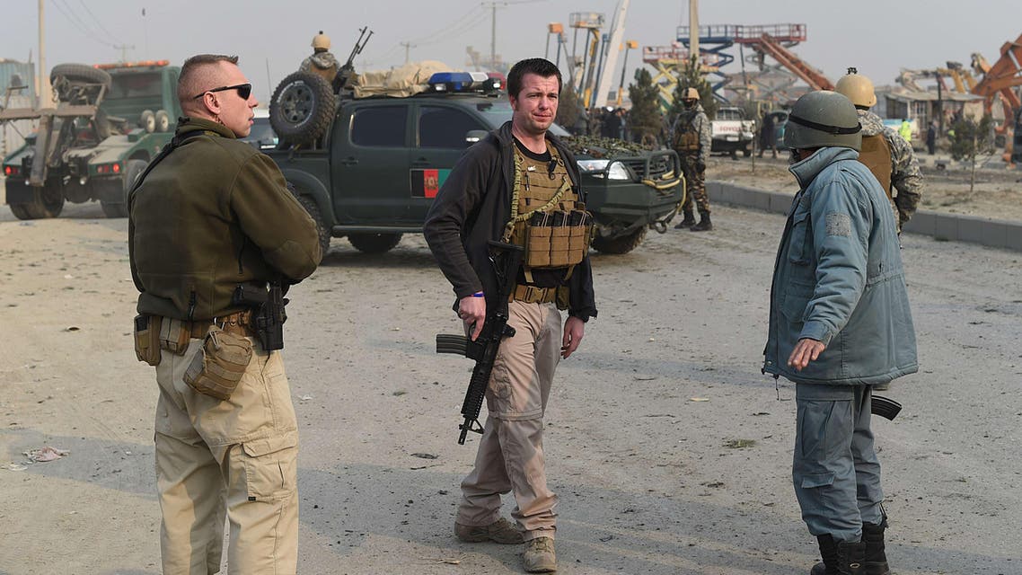 uropean Union police personnel are seen at the scene of a suicide attack on a European Union police vehicle along the Kabul-Jalalabad road in Kabul on January 5, 2015. (AFP) afghanistan EU police european