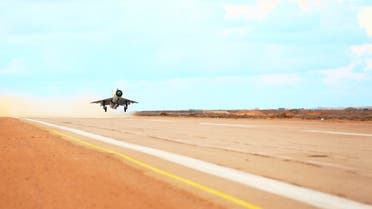 A MiG-21 fighter jet belonging to forces loyal to former general Khalifa Haftar takes off from a base on the outskirts of Al Sidra oil port, in Ras Lanuf Dec. 20, 2014. (Reuters)