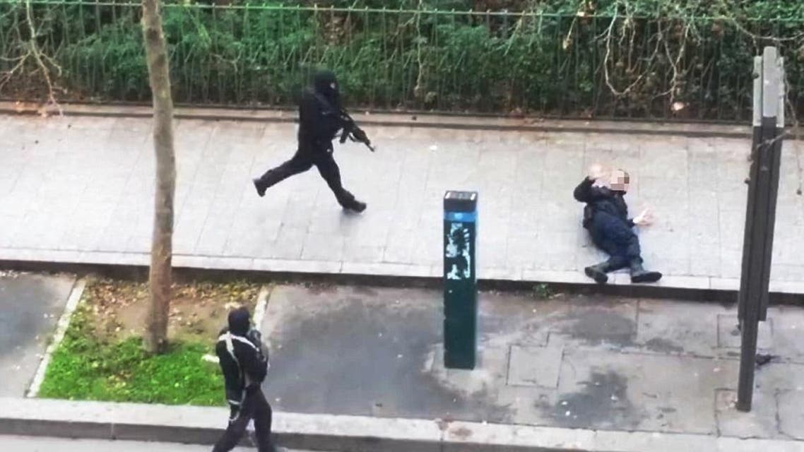 One of the gunmen shoots a police officer, believed to be Ahmed Merabet, at a close range. (Photo courtesy: YouTube)