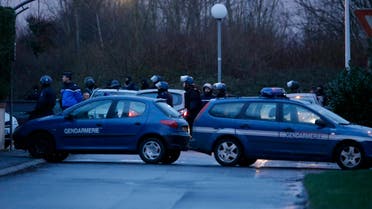 French police special forces advance during the final assault at the scene of a hostage taking at an industrial zone in Dammartin-en-Goele, northeast of Paris January 9, 2015. Reuters