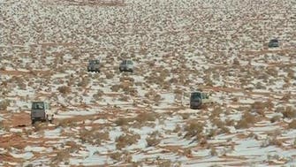 Snow blankets Saudi Arabian desert 