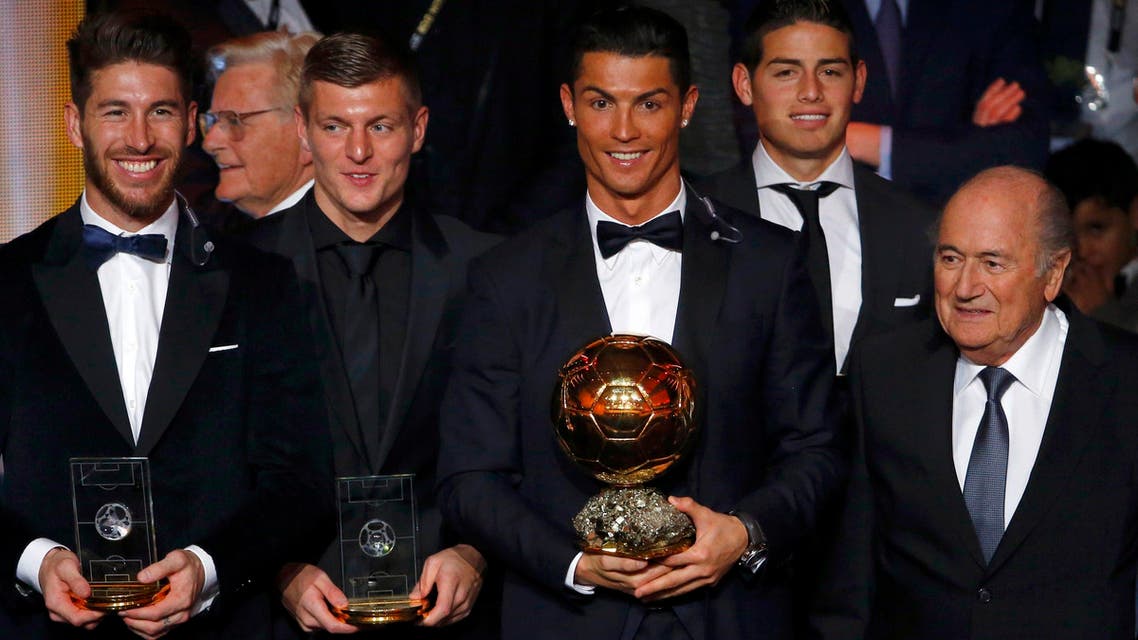 FIFA/FIFPro World XI winners Sergio Ramos of Spain, Toni Kroos of Germany, FIFA Ballon d'Or winner Cristiano Ronaldo of Portugal, FIFA Puskas Award winner James Rodriguez of Colombia and FIFA President Joseph Blatter (L-R) pose after the FIFA Ballon d'Or 2014