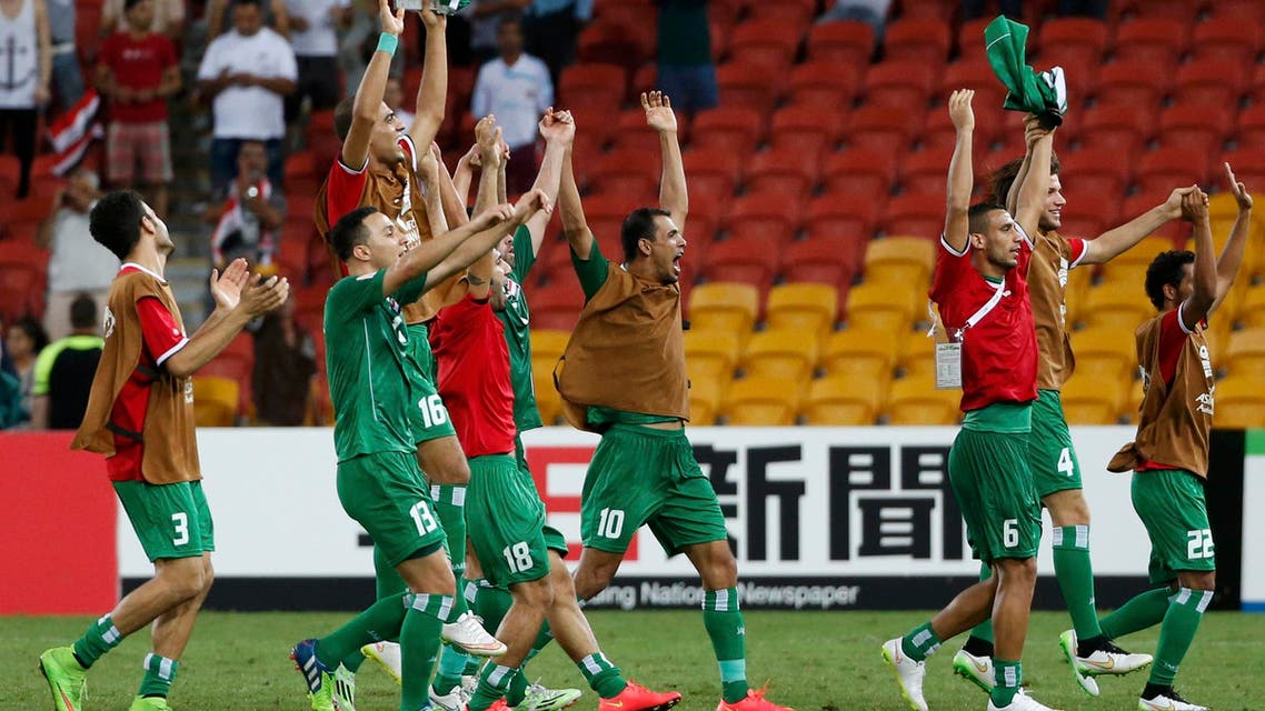 Iraq players celebrate their victory over Jordan after their Asian Cup Group D soccer match at the Brisbane Stadium in Brisbane Jan. 12, 2015. (Reuters)