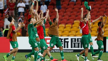 Iraq players celebrate their victory over Jordan after their Asian Cup Group D soccer match at the Brisbane Stadium in Brisbane Jan. 12, 2015.  (Reuters)
