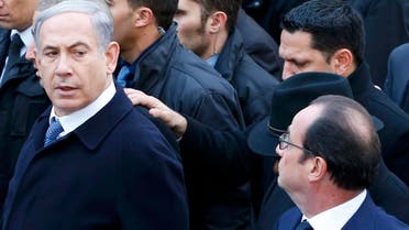 French President Francois Hollande is surrounded by heads of state including Israel's Prime Minister Benjamin Netanyahu as they attend the solidarity march (Marche Republicaine) in the streets of Paris January 11, 2015. (Reuters)