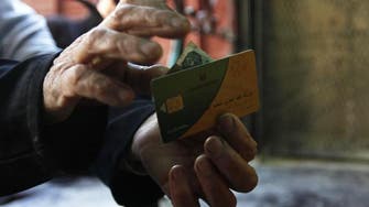 Egypt’s Sisi scores early success with smart cards for bread subsidies